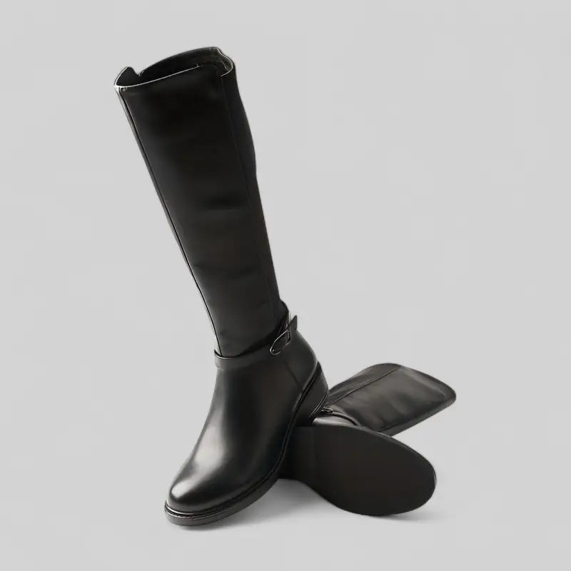 Bottes hautes noires en cuir synthétique avec talon bas et fermeture éclair