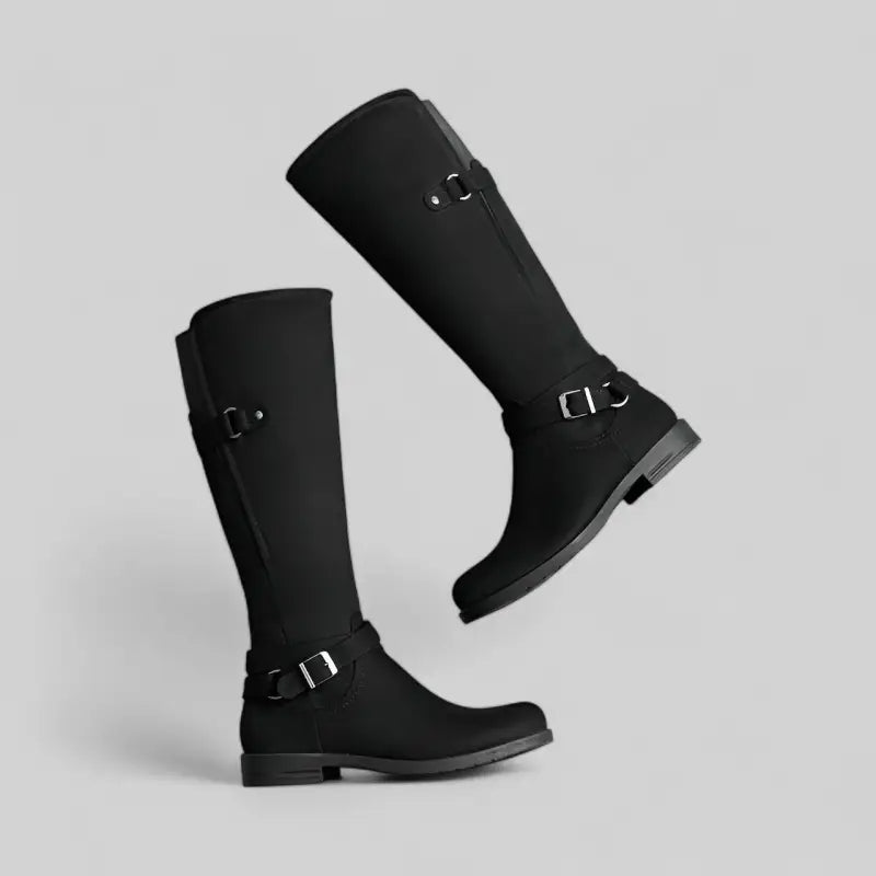 Bottes noires mi-hauteur à talon plat avec boucles décoratives