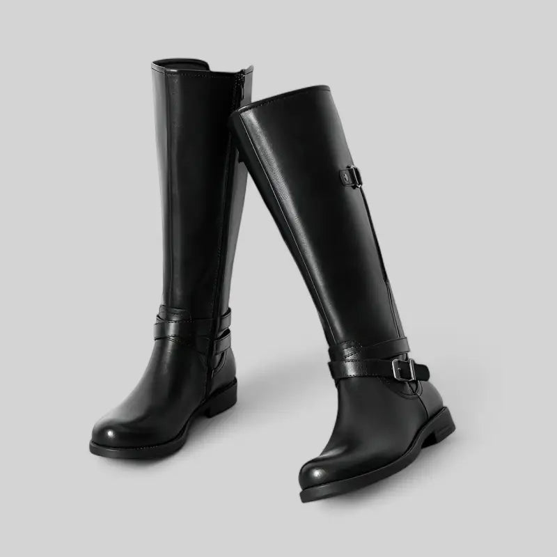 Bottes plates noires à brides et boucles pour femme