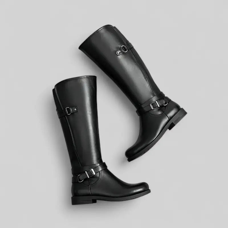 Bottes plates noires à brides et boucles pour femme